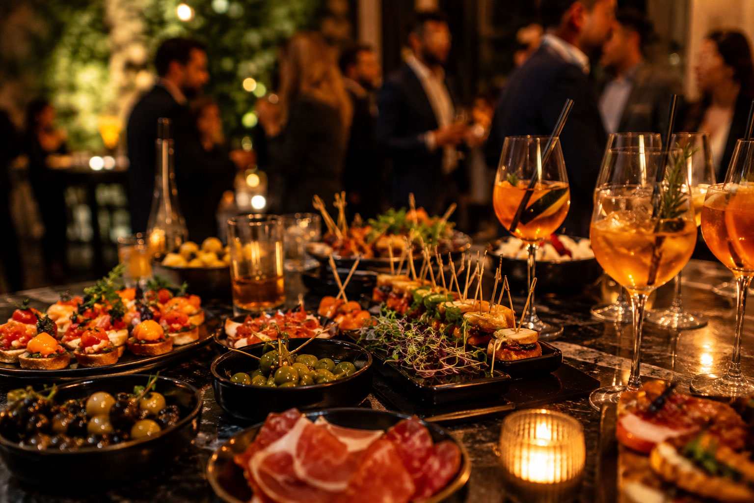 A private party with cocktails, tapas, olives and a cosy evening atmosphere